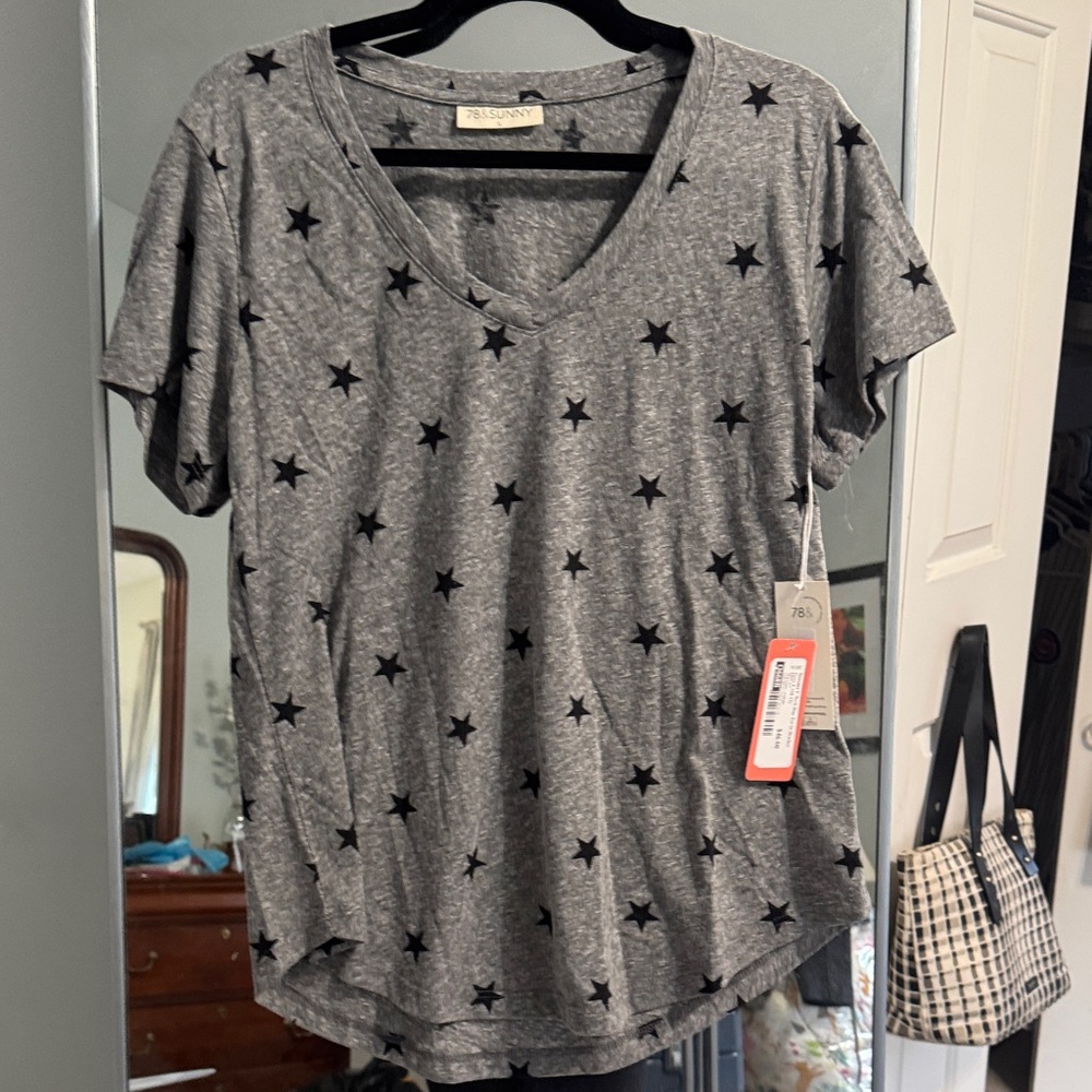 Stylish Gray V-Neck Tee with Black Star Pattern